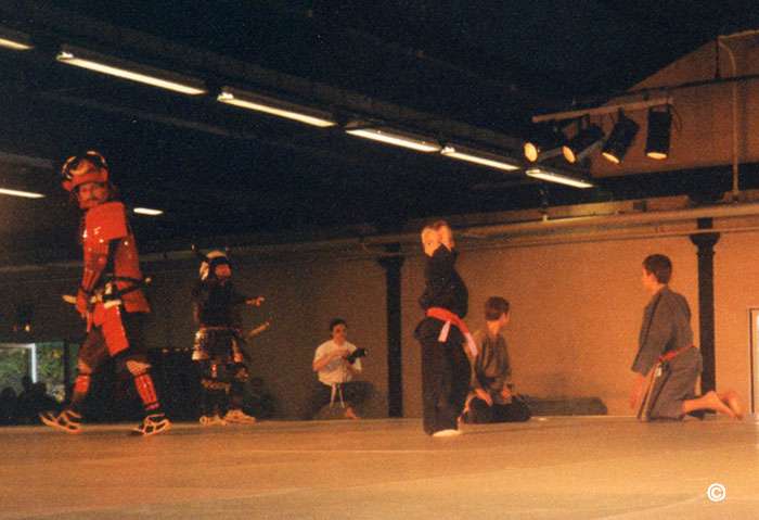 Third photo of young Brian Denis practicing ninjutsu during a competition